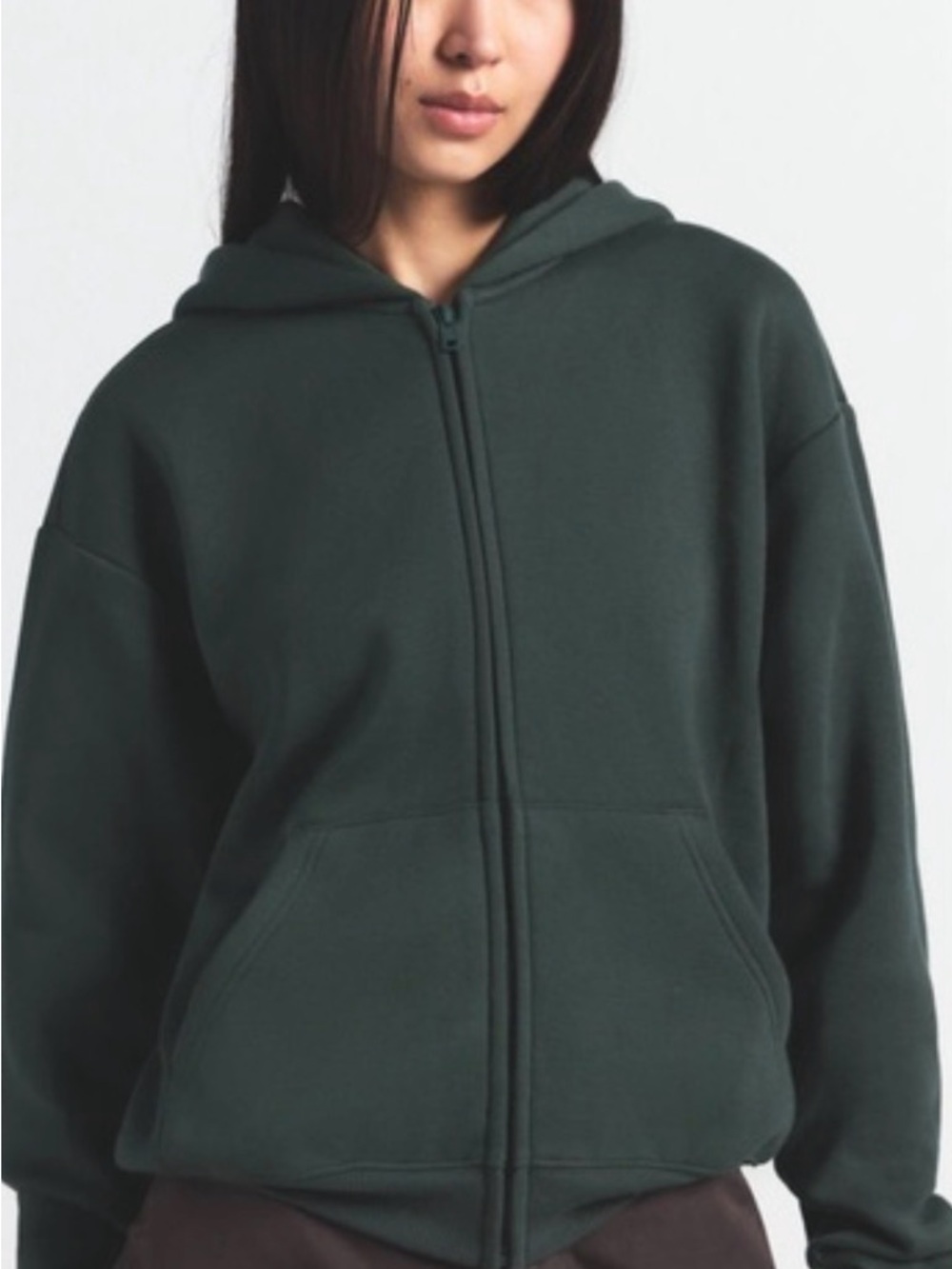 SKIMS Cotton Fleece Full-Zip Hoodie in color spruce size small